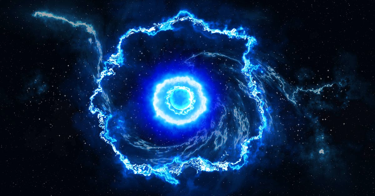 Błękitna grafika, która wygląda jak oko lub galaktyka, symbolizuje duchowe przebudzenie.